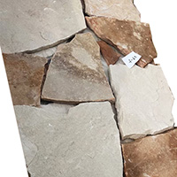 Naturally textured irregular slate paving stones in landscape setting