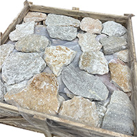 Naturally textured irregular slate paving stones in landscape setting